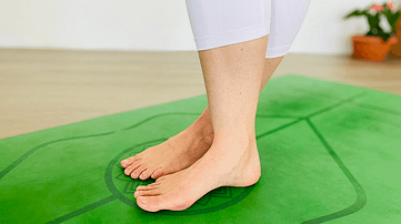 Cross feet and align your toes